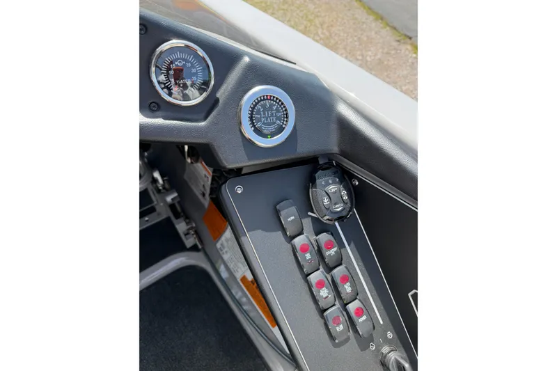 Slide: The Image of Control panel of 2025 Skeeter ZXR21 boat with gauges and switches. - 8