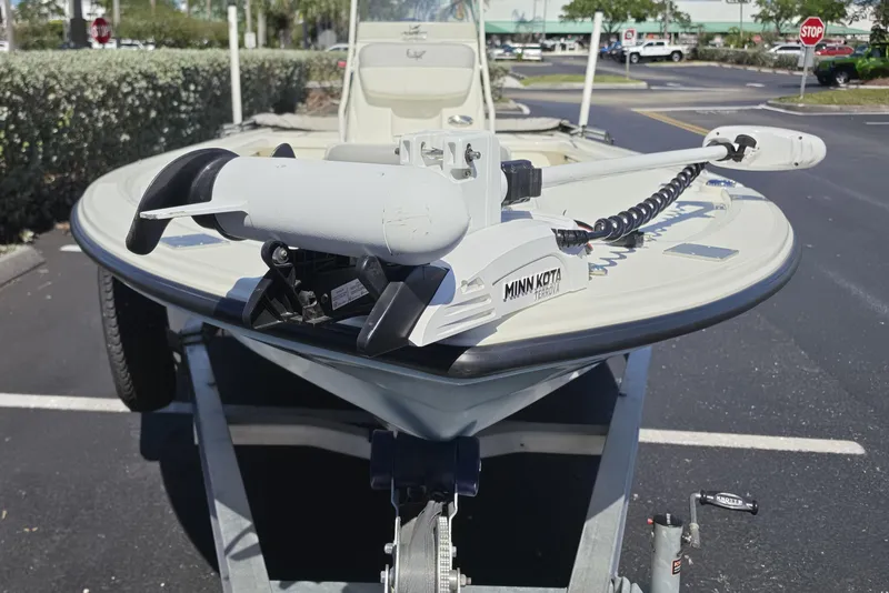 Slide: The Image of 2023 Mako 18 LTS boat with Minn Kota Terrova trolling motor on trailer. - 3