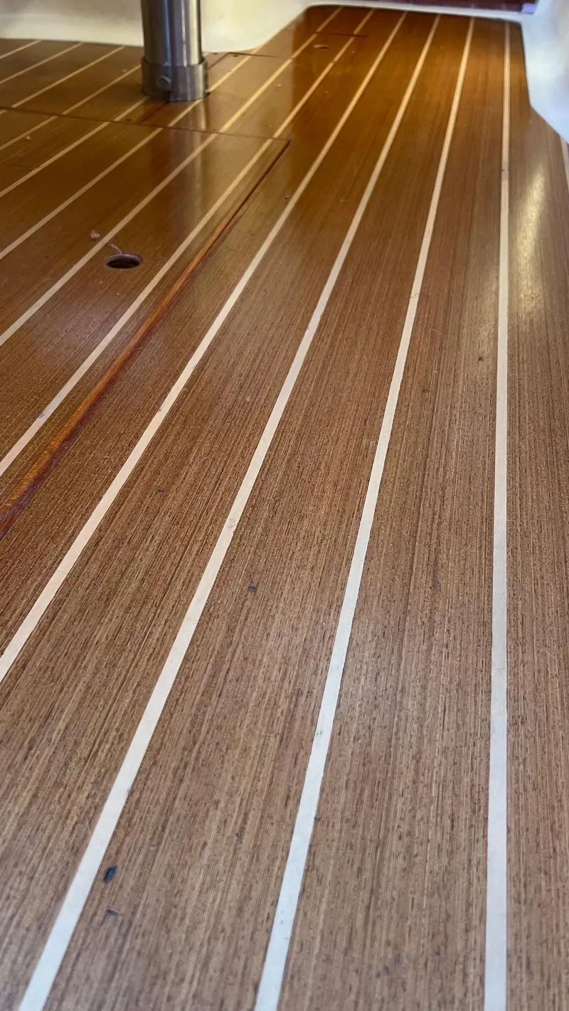 Slide: The Image of Teak deck of a 2001 Hunter 340 sailboat. - 11
