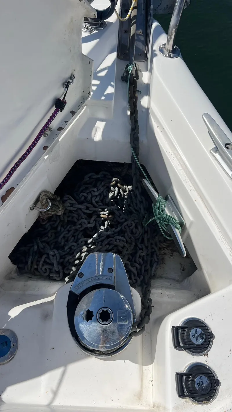 Slide: The Image of Anchor chain on a 2001 Hunter 340 sailboat. - 35