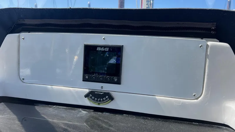 Slide: The Image of Dashboard of a 2001 Hunter 340 sailboat featuring B&G navigation system. - 46