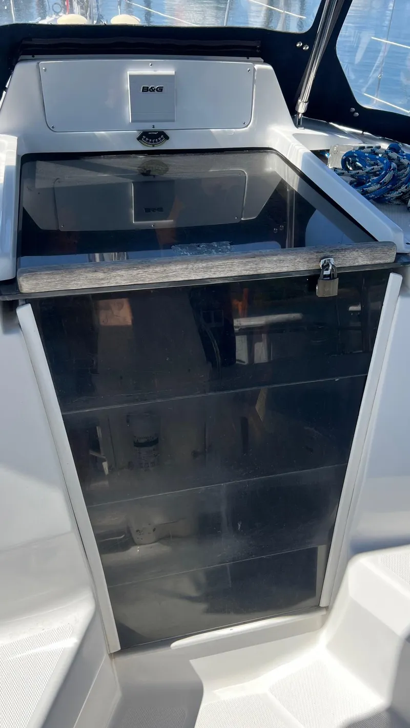 Slide: The Image of Hunter 340 sailboat cockpit, 2001 model, featuring a sleek, glossy finish. - 47