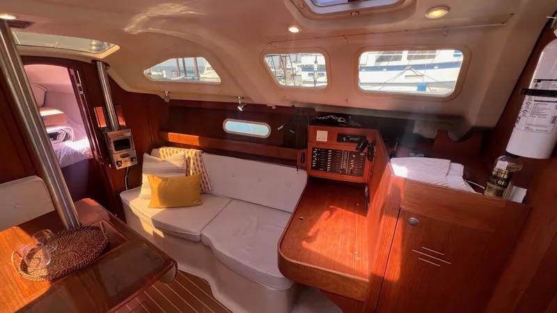 Slide: The Image of Interior of a 2001 Hunter 340 yacht with wooden furnishings. - 5