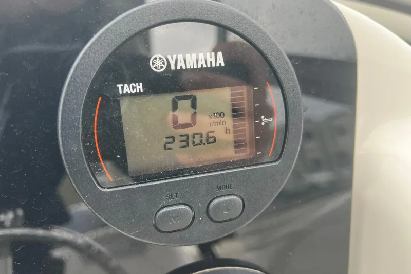 Slide: The Image of Yamaha tachometer displaying 230.6 hours on a 2022 Key West 239 DFS boat. - 23