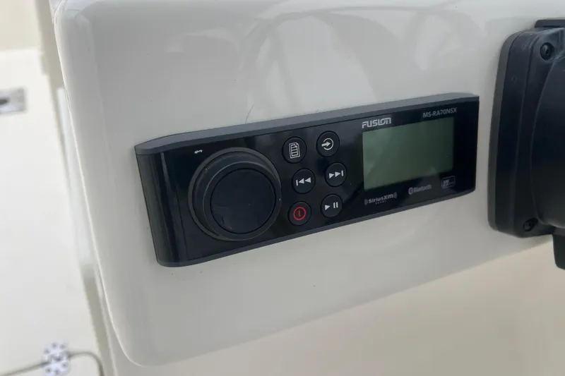 Slide: The Image of Fusion MS-RA70NSX stereo system on 2022 Key West 239 DFS boat dashboard. - 25