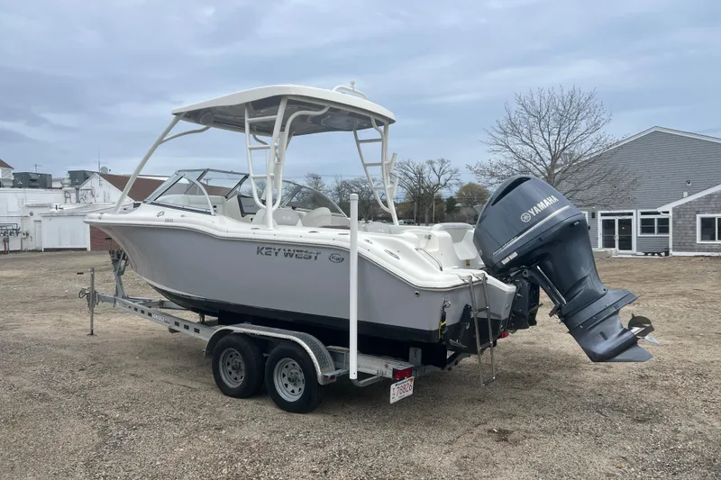 Slide: The Image of 2022 Key West 239 DFS boat on trailer with Yamaha outboard motor. - 6