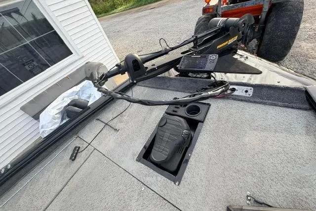 Slide: The Image of 2019 Bass Tracker Pro 19 boat deck with trolling motor and control panel. - 8