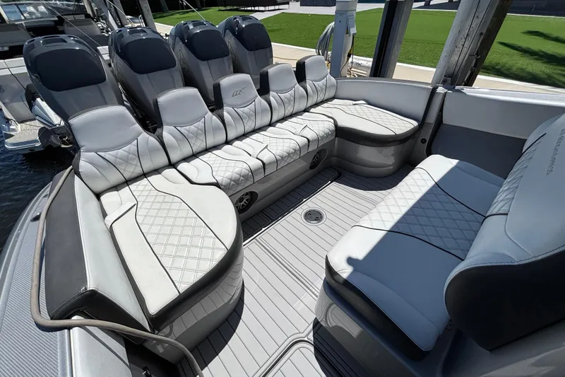 Slide: The Image of Luxurious seating on a 2021 Midnight Express 37 Open boat, featuring elegant upholstery and spacious design. - 2