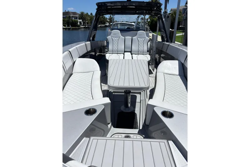 Slide: The Image of Luxurious interior of 2021 Midnight Express 37 Open boat with sleek seating and table. - 5