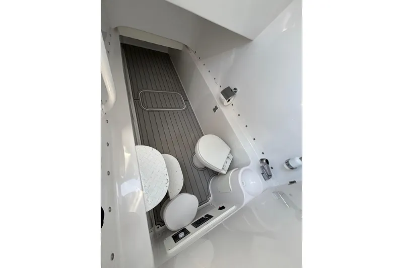 Slide: The Image of Interior of 2021 Midnight Express 37 Open boat, featuring a sleek, modern bathroom design. - 9