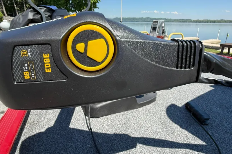 Slide: The Image of Trolling motor on 2020 Tracker Bass Tracker Classic XL boat by a lake. - 14