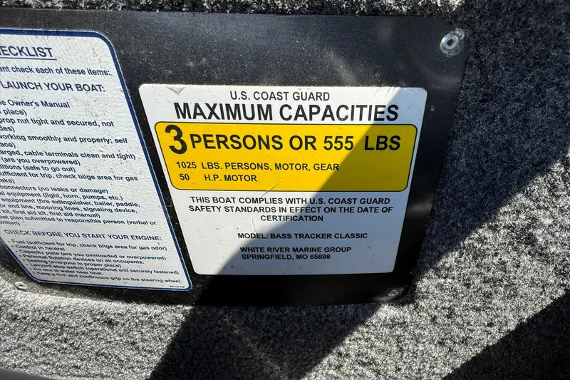 Slide: The Image of 2020 Tracker Bass Tracker Classic XL capacity label, 3 persons or 555 lbs, U.S. Coast Guard compliant. - 15