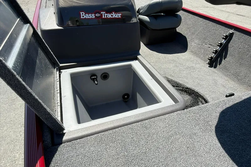 Slide: The Image of 2020 Tracker Bass Tracker Classic XL boat with open storage compartment and seating. - 7