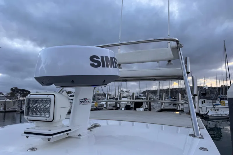 Slide: The Image of 1985 Chris-Craft 21 Scorpion Cuddy with radar and spotlight at marina. - 35