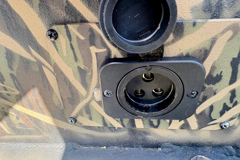Slide: The Image of 2022 Lowe Roughneck 1860CC camo-patterned electrical socket detail. - 10