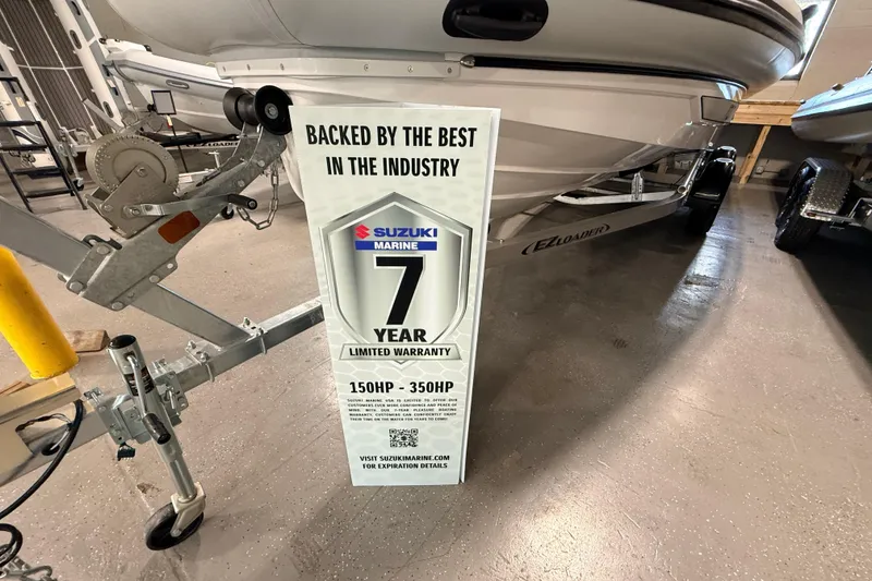 Slide: The Image of Boat trailer with Suzuki Marine 7-year warranty sign, Highfield ADV7 2026 model. - 32