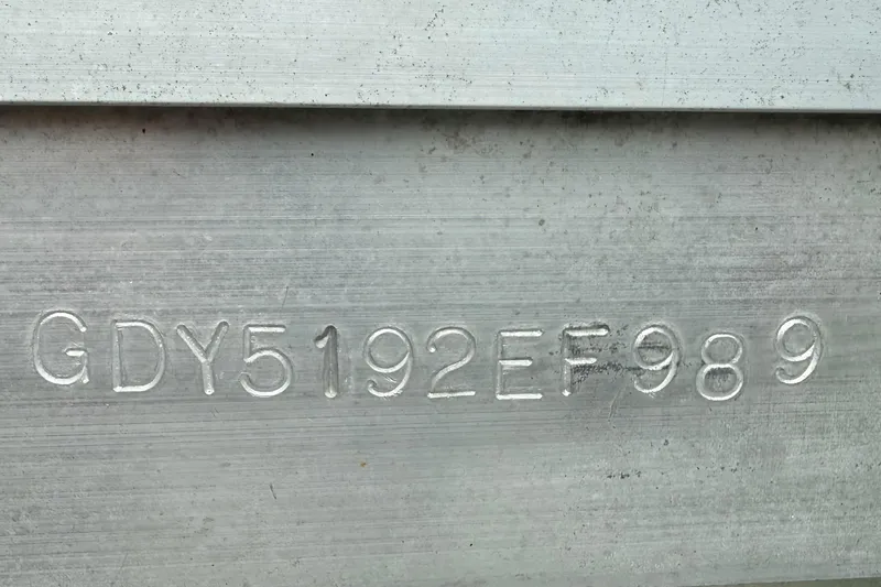 Slide: The Image of Hull identification number on 1989 Godfrey Aqua Patio 2424 boat. - 11