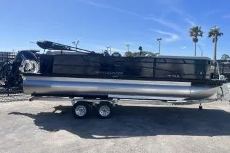 The Image of 2026 Princecraft Vectra 23 L pontoon boat on trailer under clear blue sky. - 1