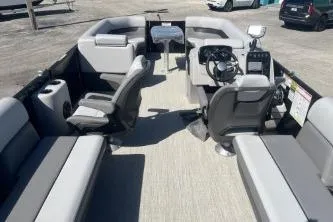 Slide: The Image of 2026 Princecraft Vectra 23 L pontoon boat interior with seating and steering console. - 11