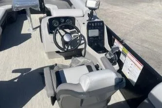 Slide: The Image of 2026 Princecraft Vectra 23 L boat interior with steering wheel and control panel. - 12