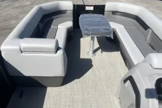 Slide: The Image of 2026 Princecraft Vectra 23 L pontoon boat interior with gray seating and table. - 13