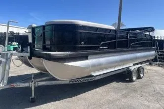 Slide: The Image of 2026 Princecraft Vectra 23 L pontoon boat on trailer, sleek design, outdoor setting. - 4