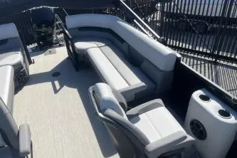 Slide: The Image of 2026 Princecraft Vectra 23 L pontoon boat interior with spacious seating and modern design. - 9