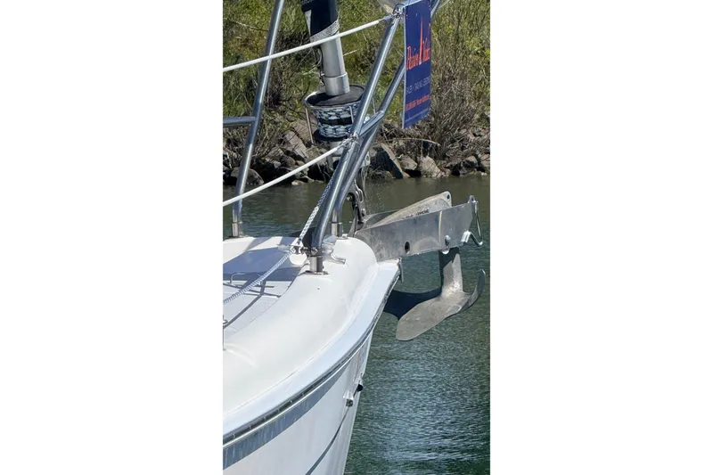 Slide: The Image of Bow of a 2002 Hunter 386 sailboat with anchor and railing. - 31
