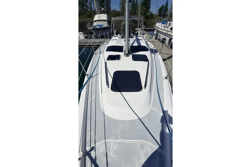 Slide: The Image of 2002 Hunter 386 sailboat docked at marina, top deck view. - 36
