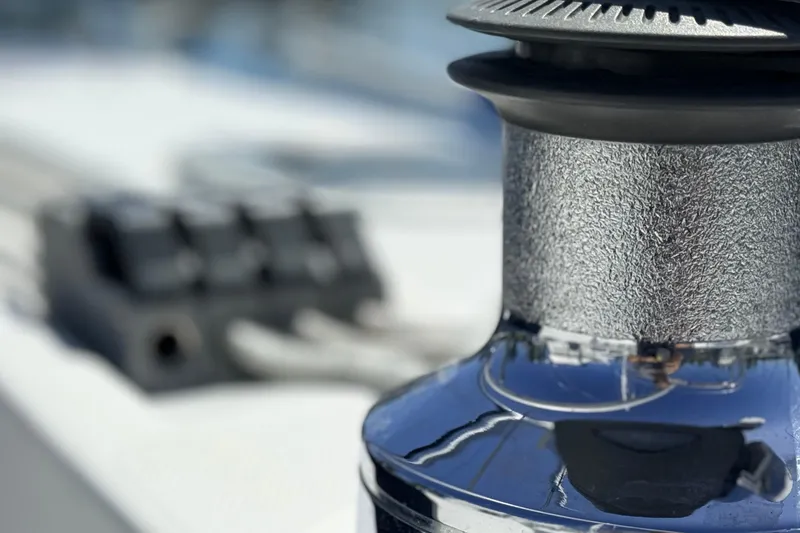 Slide: The Image of Close-up of a winch on a 2002 Hunter 386 sailboat deck. - 40