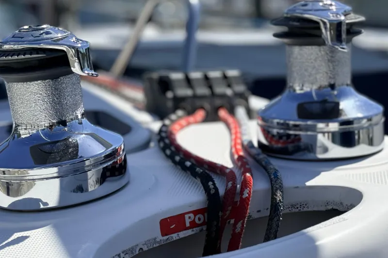 Slide: The Image of Close-up of winches and ropes on a 2002 Hunter 386 sailboat deck. - 41