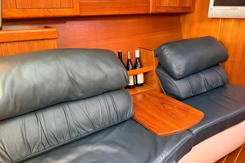 Slide: The Image of Luxurious interior of 2002 Hunter 386 yacht with leather seating and wooden accents. - 7