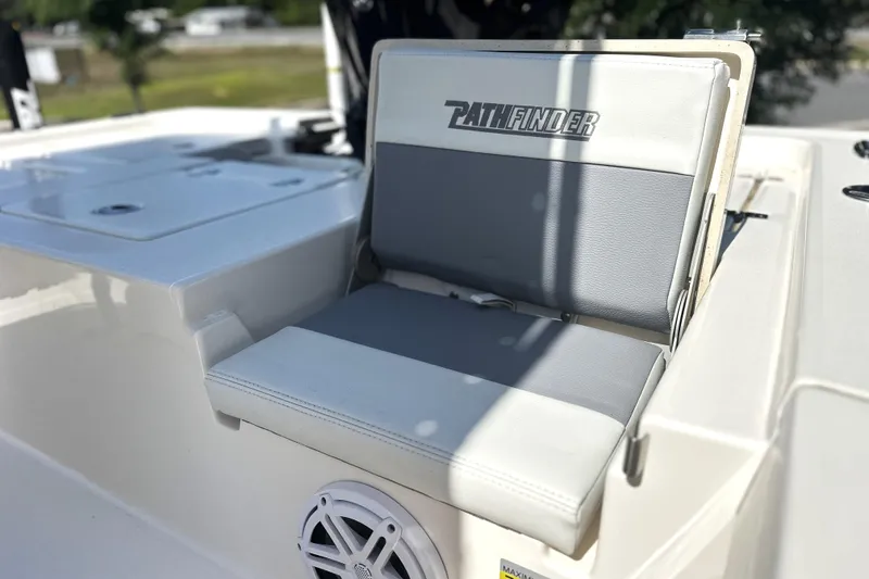 Slide: The Image of 2023 Pathfinder 2200 TRS boat seat with logo and speaker detail. - 12