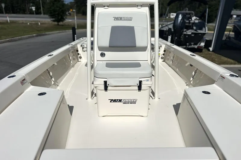 Slide: The Image of 2023 Pathfinder 2200 TRS boat interior with seating and storage compartments. - 7