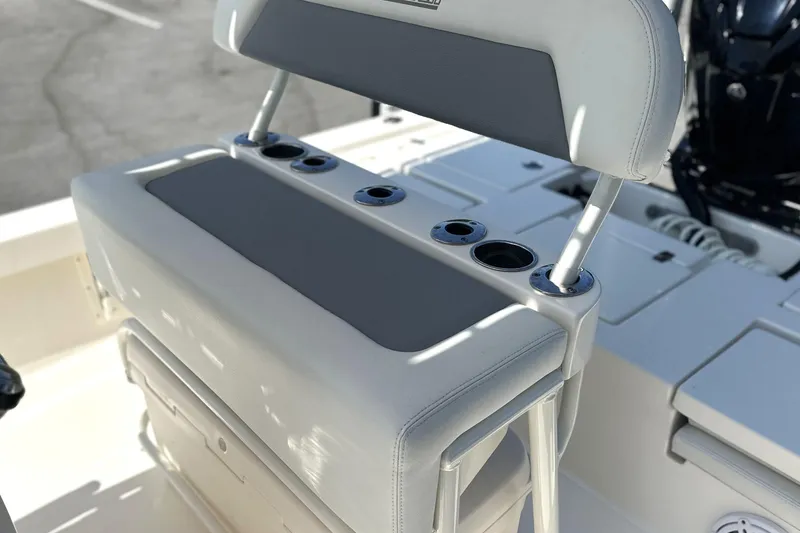 Slide: The Image of 2023 Pathfinder 2200 TRS boat seating with integrated cup holders, showcasing modern design. - 9