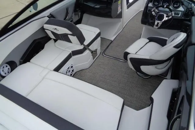 Slide: The Image of 2019 Monterey 218SS Super Sport boat interior with sleek seating and modern dashboard design. - 16