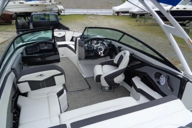 Slide: The Image of 2019 Monterey 218SS Super Sport boat interior with sleek seating and modern dashboard. - 17