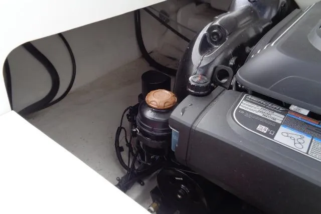 Slide: The Image of Engine compartment of 2019 Monterey 218SS Super Sport boat, showcasing mechanical components. - 30