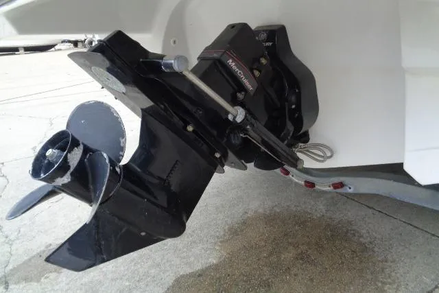 Slide: The Image of 2019 Monterey 218SS Super Sport boat outboard motor close-up on concrete surface. - 31