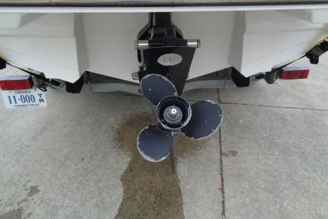 Slide: The Image of Rear view of 2019 Monterey 218SS Super Sport boat propeller on concrete surface. - 32