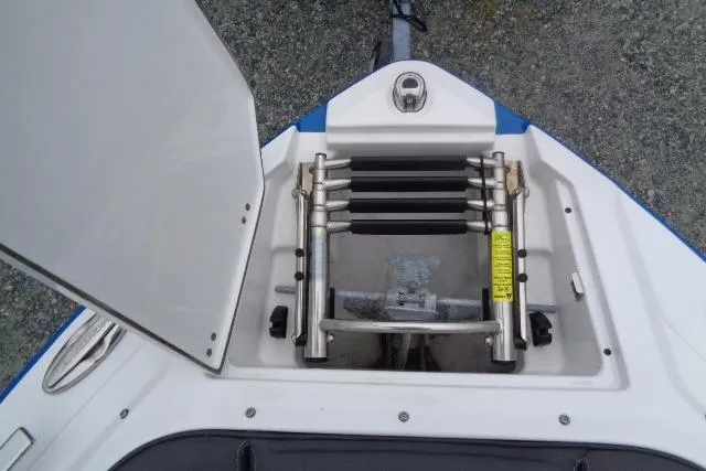 Slide: The Image of 2019 Monterey 218SS Super Sport boat ladder compartment, open hatch view. - 5