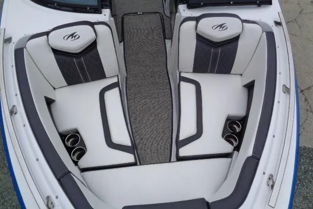 Slide: The Image of 2019 Monterey 218SS Super Sport boat interior with stylish seating and cup holders. - 6