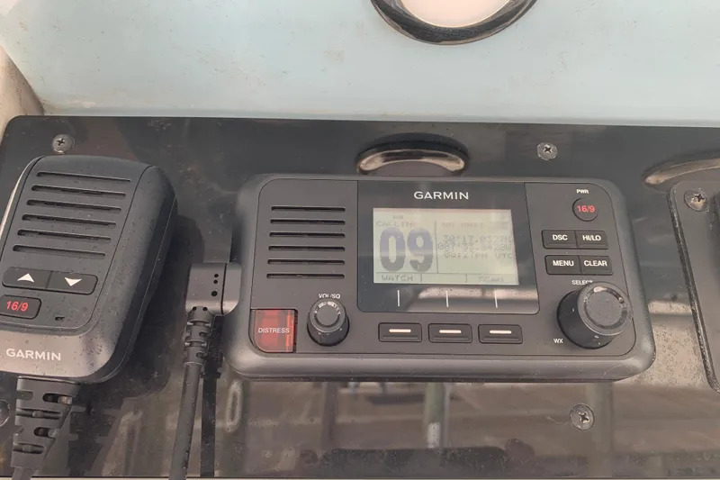 Slide: The Image of Garmin marine radio on 2020 Sea Hunt Ultra 275 SE boat dashboard. - 8