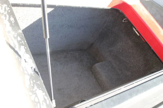 Slide: The Image of Storage compartment in 2011 Malibu Wakesetter 20 VTX boat. - 13