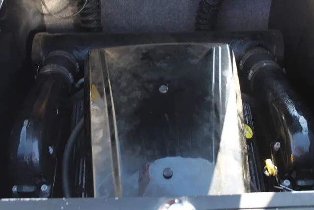 Slide: The Image of Engine compartment of a 2011 Malibu Wakesetter 20 VTX boat. - 15