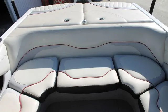 Slide: The Image of Interior of a 2011 Malibu Wakesetter 20 VTX with white upholstery. - 6