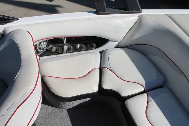 Slide: The Image of 2011 Malibu Wakesetter 20 VTX interior seating with cup holders. - 7