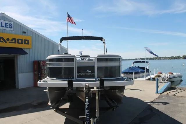 Slide: The Image of Bennington 22 SSRCX pontoon boat at dock, 2021 model. - 4