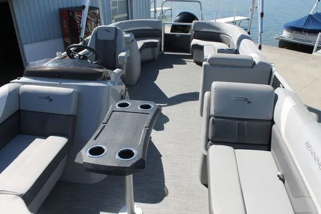 Slide: The Image of Interior of a 2021 Bennington 22 SSRCX pontoon boat with gray seating. - 5