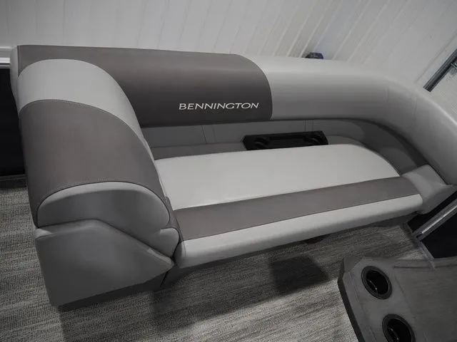 Slide: The Image of Bennington S Quad Bench 21 SSR 2025, gray upholstery, interior view. - 13